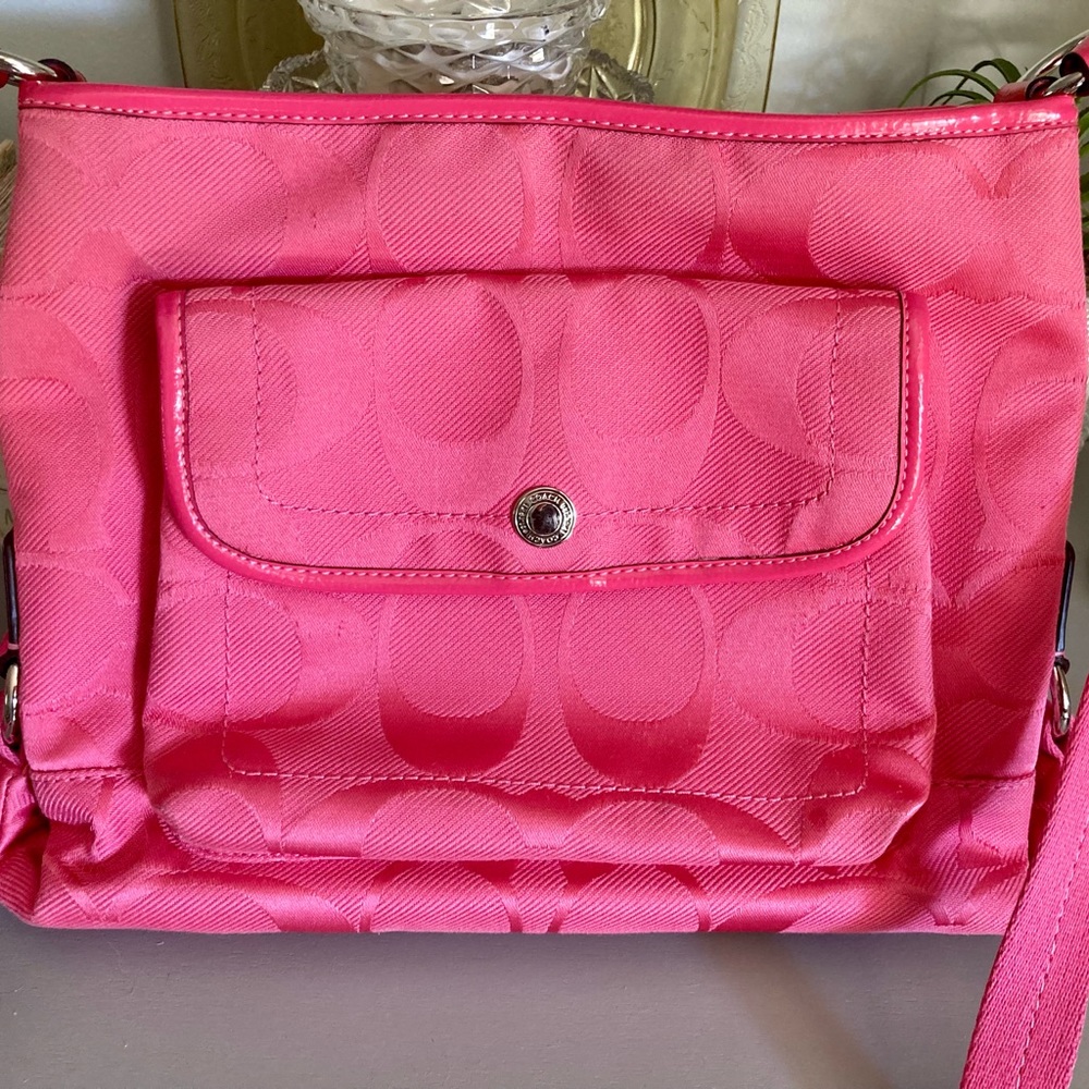 Pink coach signature getaway nylon file crossbody bag with adjustable strap